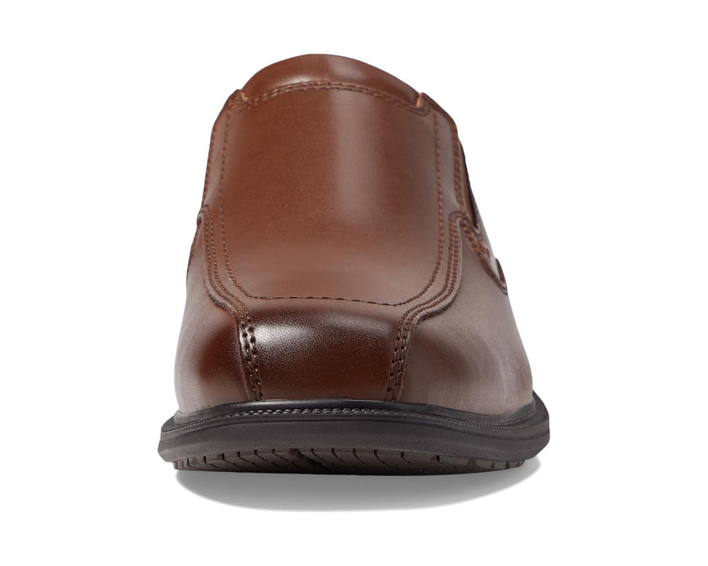 Men's Nunn Bush Bleeker Street Bicycle Toe Slip-On with KORE Slip Resistant Walking Comfort Technology Cognac