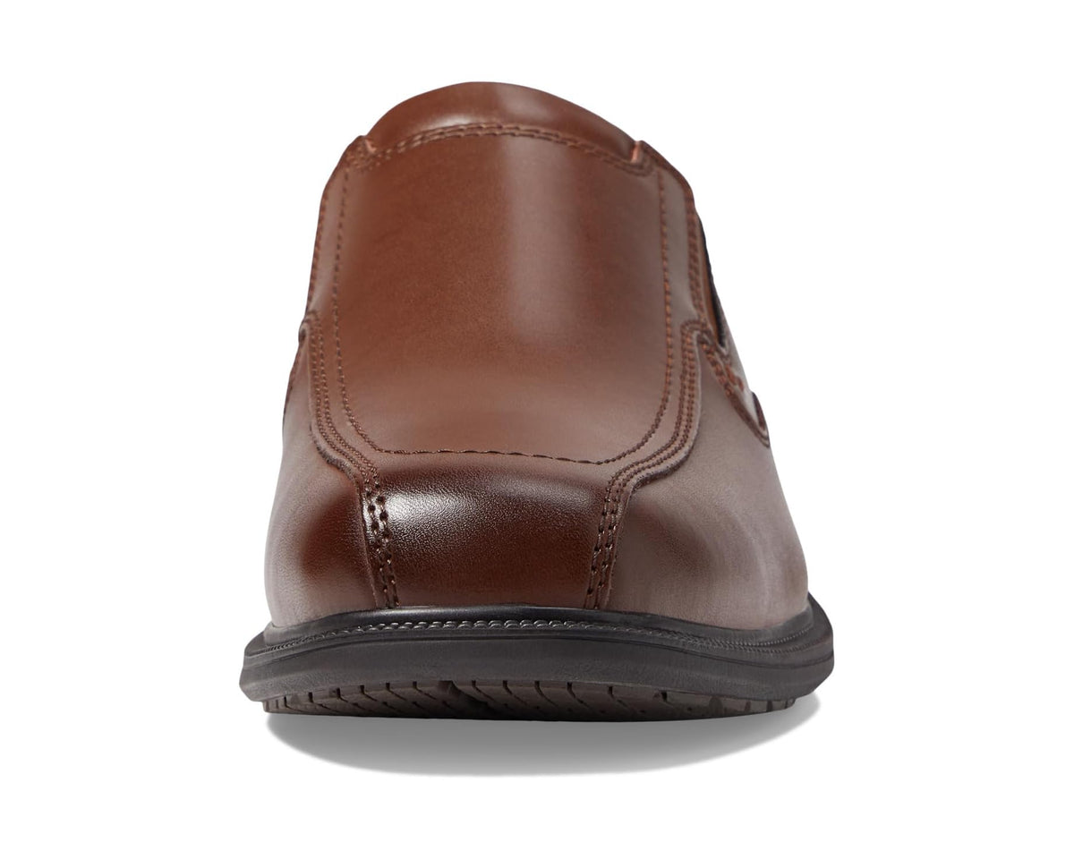 Men's Nunn Bush Bleeker Street Bicycle Toe Slip-On with KORE Slip Resistant Walking Comfort Technology Cognac